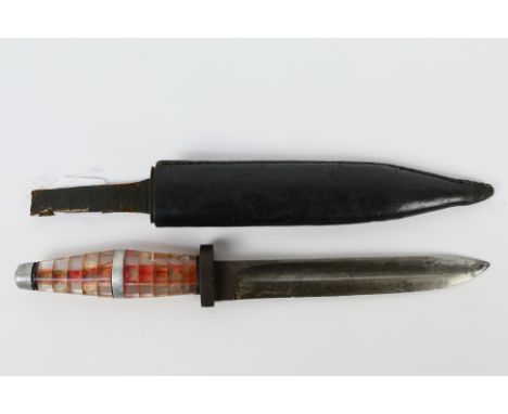 A World War Two (WW2 / WWII) period Czech fighting knife with 16 cm (l) blade stamped CZE over H, perspex grip and leather wr