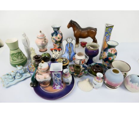 Mixed ceramics to include Beswick, Chinese, Japanese, Poole Pottery and other. [W]