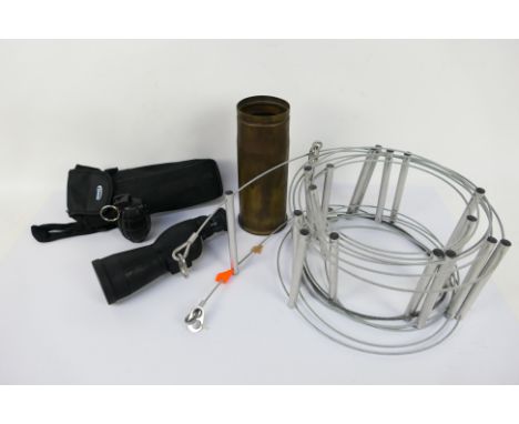 Lot to include a monocular scope, cable ladder, shell casing and replica grenade. [W]