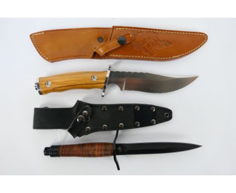 Two knives comprising a Colt fighting knife # CT585 contained in sheath and a Maserin, Italy. [2]. [W].Note: This lot is not 