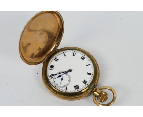 A yellow metal cased full hunter pocket watch, the case marked Illinois Watch Case Co, Elgin, USA, the white dial with Roman 