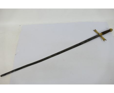 An antique Masonic sword with wire bound wooden grip, brass guard and pommel, 81 cm (l) blade. [W]Note: This lot is not for s