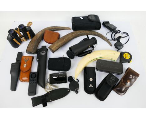 Lot to include knife sheaths, camera, binoculars, monocular scope, horns for making scales and other. [W].