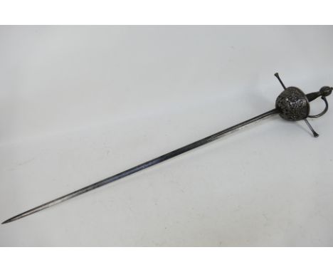 An antique cup hilt rapier type sword with 90 cm blade, the wire bound grip with fluted globular pommel and cup decorated wit
