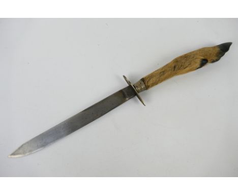 An antique deer foot hilt knife with 20 cm (l) blade. [W]Note: This lot is not for sale to people under the age of 18. By bid