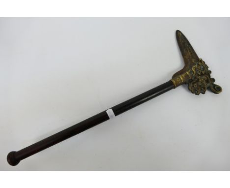 An antique bronze dagger-axe on later short shaft. [W]Note: This lot is not for sale to people under the age of 18. By biddin
