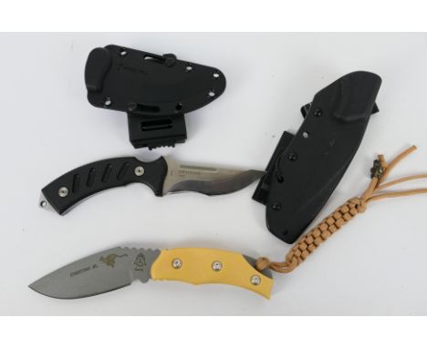 Two knives comprising a Tops Cheetah XL with 10 cm (l) curved blade and contained in kydex sheath and a similar Steel Will kn