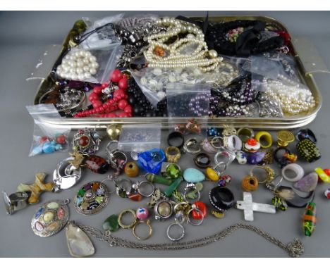 A good selection of vintage and later costume jewellery and rings including a miracle brooch, enamel earrings, mineral stone 