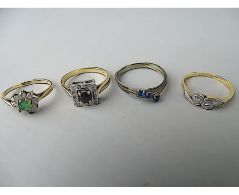 Three 9 carat gold dress rings and one other including a cross over two diamond in illusion setting, size L, a paste set ring