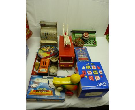 Quantity of vintage tinplate and other toys including a St Michael tin, cash till, a Mettoy typewriter, a wooden built fire e