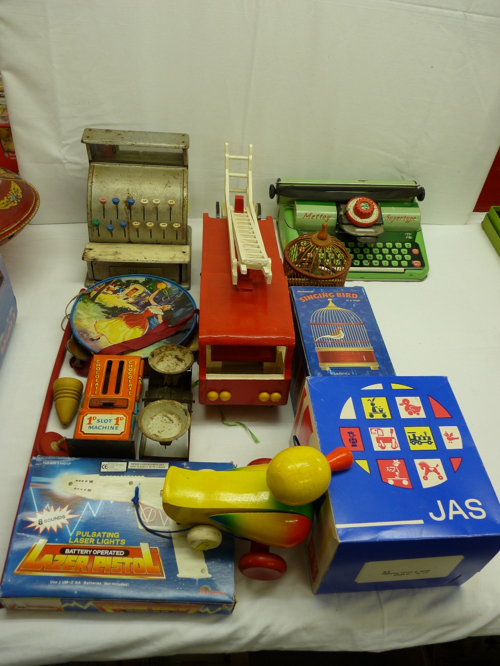 Quantity of vintage tinplate and other toys including a St Michael tin