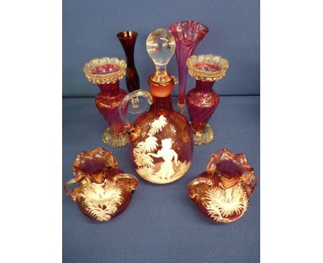 Cranberry glass decanter with stopper and a pair of frilly top vases decorated Mary Gregory style, a pair of twist vases and 