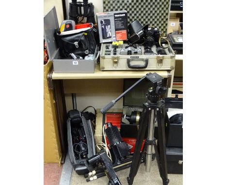 An SLR Digital and video camera collection and equipment including a cased Zenit-E with various lenses along with a pair of Z