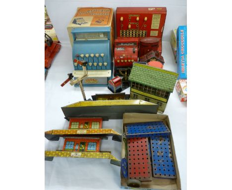 Mixed group of vintage tinplate and metal toy collectables including a pre-decimal cash register, a toy telephone exchange, P