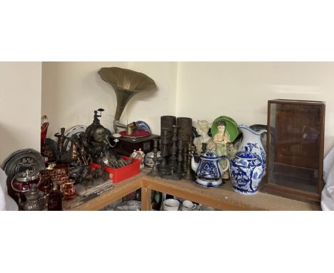 A large lot including a silver handled carving knife and fork, electropolated cutlery, elephant clock, decorative plates, rub