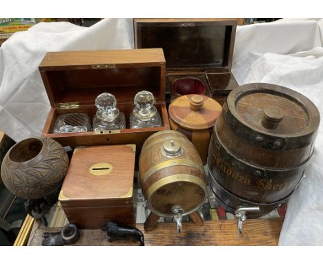 A Victorian rosewood sarcophagus tea caddy, together with a three bottle tantalus, African carvings, sherry barrels, first ai