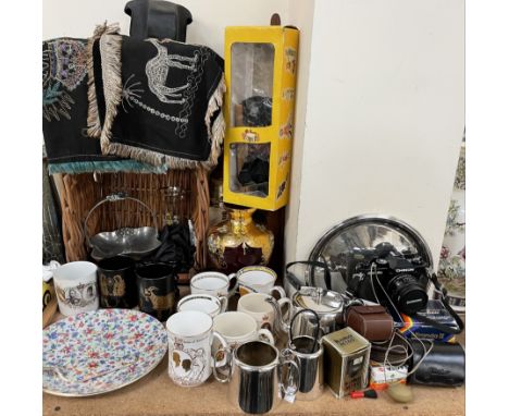 A Bells whisky decanter together with commemorative mugs, electroplated part tea set, glass vase, basket, Egyptian tapestries