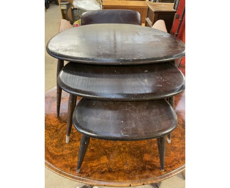 An Ercol pebble nest of tables 