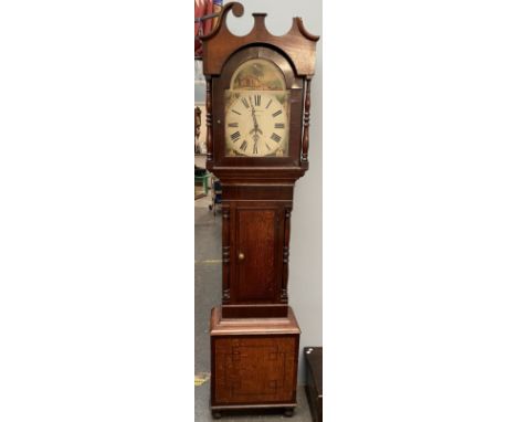 A 19th century oak and mahogany longcase clock, with a broken swan neck pediment and spindles above a trunk door enclosed bet