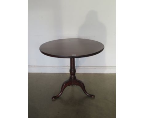 A Georgian style mahogany tilt top tripod table originally from Simon Horn, 71cm H x 77cm diameter 