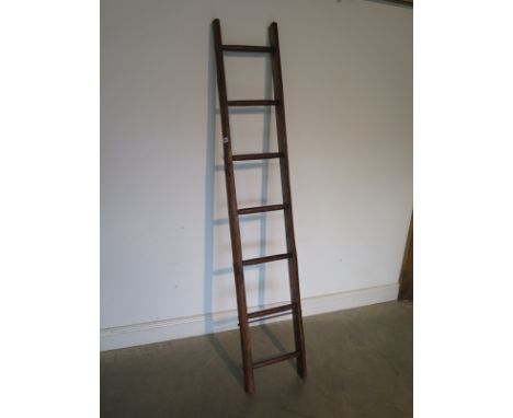 A Vintage seven rung ladder, waxed for decorative purposes - 196cm H 