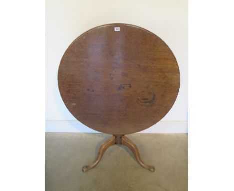 A Georgian mahogany tilt top tripod table, 71cm H x 88cm W 