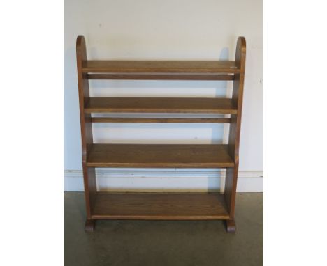 A 1930's oak bookcase - approx 102cm H x 82cm x 28.5cm 