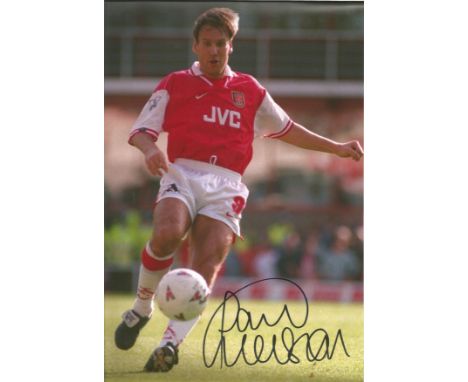 Football Paul Merson signed 12x8 colour photo pictured in action for Arsenal. Good Condition. All autographs are genuine hand