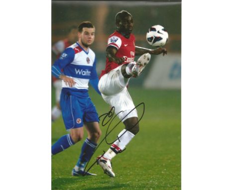 Football Emmanuel Eboue signed 12x8 colour photo pictured in action for Arsenal. Emmanuel Eboue (born 4 June 1983) is an Ivor