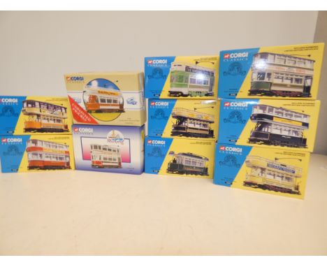 10x Corgi boxed model vans