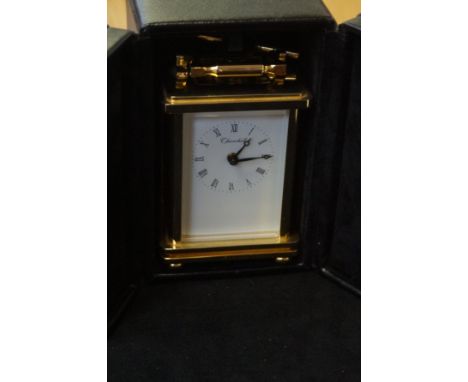 Brass Churchill carriage clock &amp; key in leather box