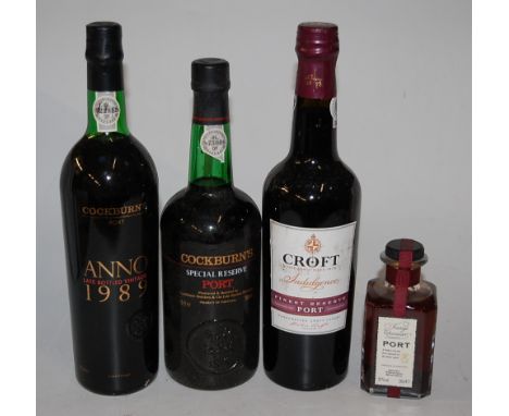 Croft Finest Reserve Port, two bottles; Cockburn's Special Reserve Port, two bottles; Anno LBV Port, 1989, one bottle; and a 