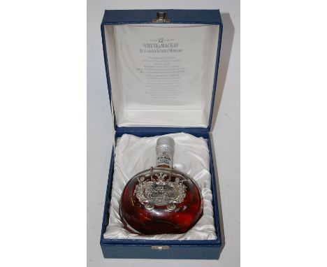 Whyte & Mackay 12 year old Charles & Diana Blended Scotch Whisky, 75cl, 40%, in original presentation case; and P&O Cruises X