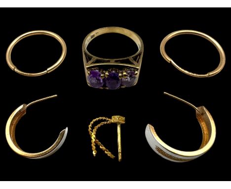 Two pairs of 9ct gold hoop earrings, three 9ct gold earring backs and an 8ct gold three stone ringCondition Report:9ct approx