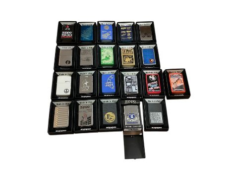 Twenty one Zippo lighters, all in original boxes 