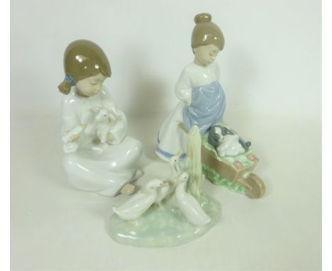 Nao figurine with puppy, another Nao figurine with lamb and Nao ducks (3)