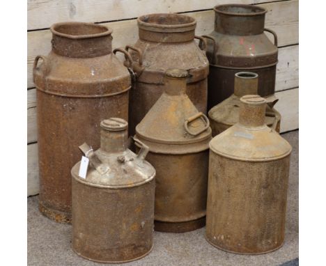 Three vintage milk churns and four vintage paraffin containers   Condition Report   Click here for further images, condition,