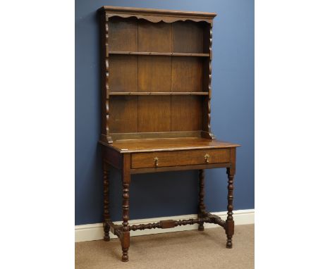 Late 18th century oak side table on bobbin turned stretcher base, single drawer, with later plate rack, W87cm, H73cm, D54cm