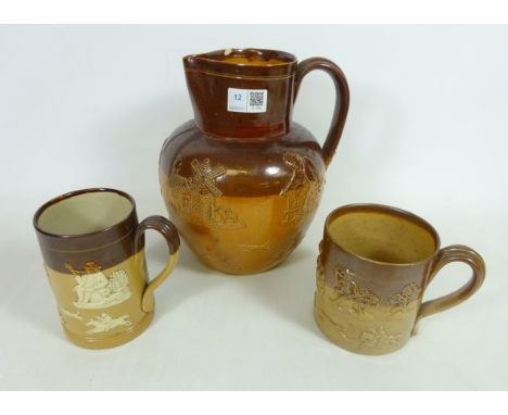 Large Victorian Doulton Lambeth stoneware pitcher decorated with hunting scene, a Royal Doulton stoneware hunting mug and one