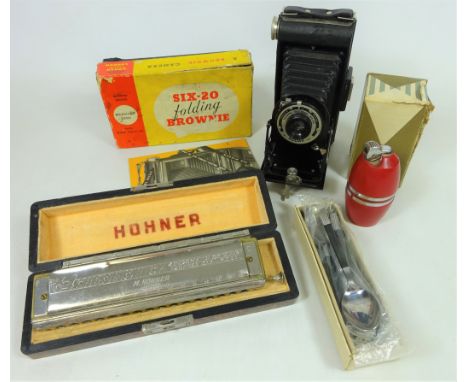 Honer 'The 64 Chronomonica' by Hohner in case, a Brownie Six-20 folding camera in box, Art Deco Poppell table lighter and a s