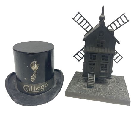 Early 20th century French bronze money bank in the form of a windmill with revolving sails, on oblong base H20cm; and tin-pla