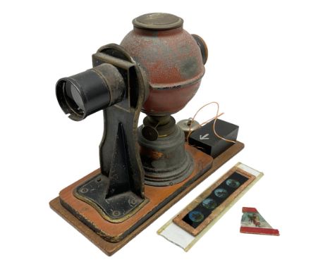 Ernst Plank Germany toy tin-plate fixed lens magic lantern of globular form with original burner and additional battery power