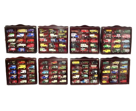 Set of eight wall mounting die-cast model display cabinets, each with hinged glazed door and containing fifteen modern promot