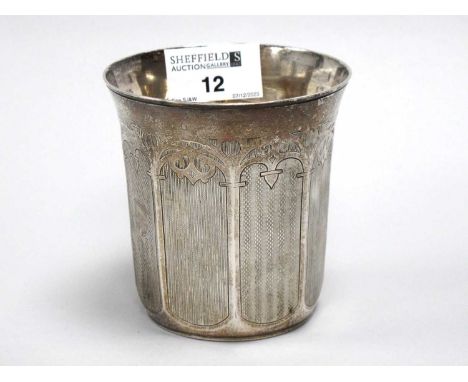 A Large Russian Beaker, of tapering panelled form, allover engine turned and scroll arch engraved, stamped marks (incomplete)
