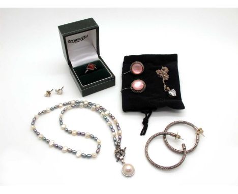 A Collection of Silver Jewellery, to include hoop earrings, amber coloured stone ring, claw set pendant necklace, peacock pea