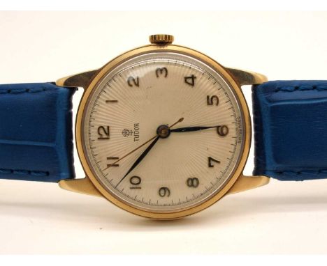 Tudor; A Vintage 9ct Gold Cased Gent's Wristwatch, the signed textured dial with Arabic numerals and centre seconds, the move