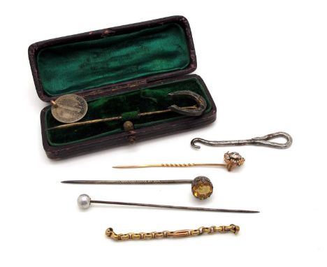 A Vintage Horseshoe Stickpin, stamped "Sterling Silver", together with further stickpins, part chain etc.