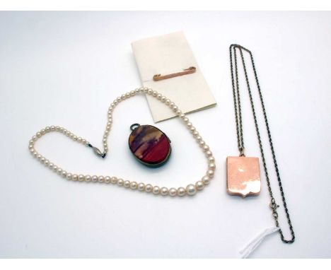 A Shield Shape Locket Pendant, (indistinctly stamped) on a 9ct gold chain; A Graduated Single Strand Pearl Bead Necklace, (cl