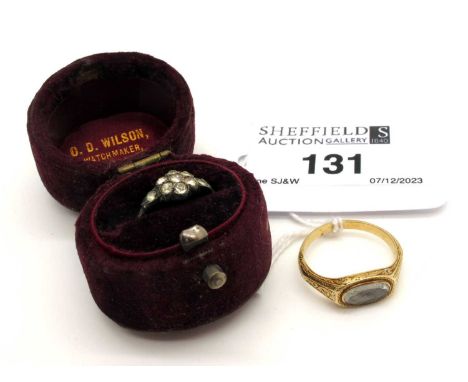 A Dainty XIX Century Mourning Ring, the oval glazed panel encasing woven hair, within engraved setting (finger size I); a dai