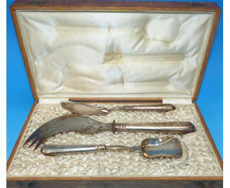 An early 20th century Russian silver 3 piece tea preserves cutlery, the bread fork with steel blade, in fitted oak box